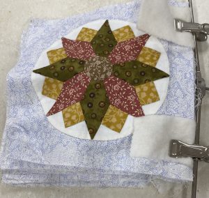 Lynne started quilt 10 years ago but does not like the middle of design