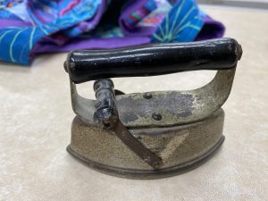 Julie-Ann lace iron used as door stop