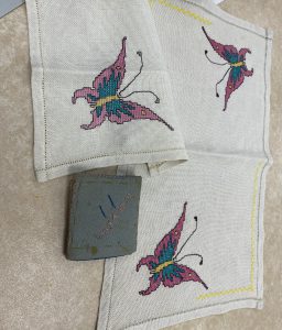 Dawn place mats made age 12 and needle book done in year 4