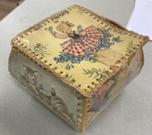 Viive given box by Aunties when she was 7 years old